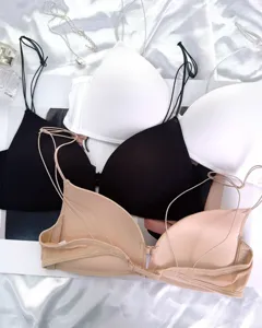 Wireless push-up bra detail view, front closure design with thin multi straps and backless style.