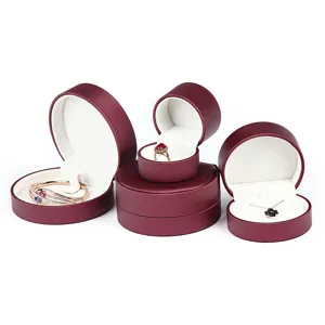 Luxury round brushed leather jewelry boxes set for rings, bracelets and necklaces gift packaging.