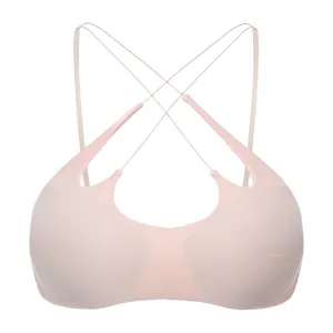 Detailed view of the pink wireless strappy bralette with sexy cross straps and cutout design.