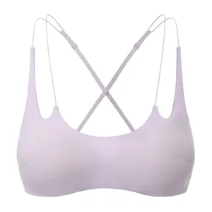 Seamless wireless push-up bra in light purple with chic multi thin cross straps for women.