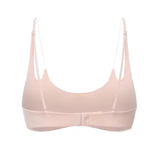 Detail view of a sexy wireless French thin pink bra with delicate double straps and back closure.