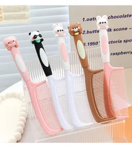 Close-up detail of cute cartoon animal hair combs in acrylic stand, pastel pink and brown.
