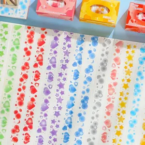 Colorful decorative washi tape sets with cute stars and hearts patterns for DIY journaling.