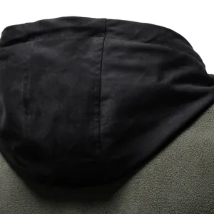 Close-up detail of mens black suede spliced army green fleece hoodie jacket winter warm.