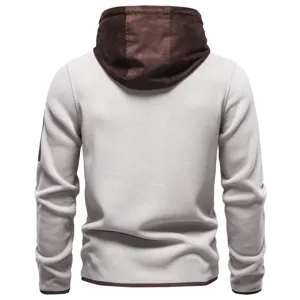 Men's fleece hoodie with contrasting suede panels, thick warm winter outerwear.