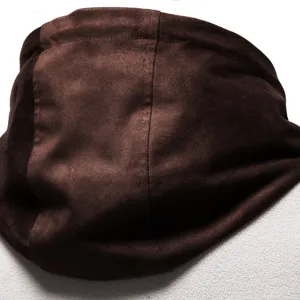 Brown suede patchwork fleece hoodie detail, soft texture and warm winter garment close-up view.