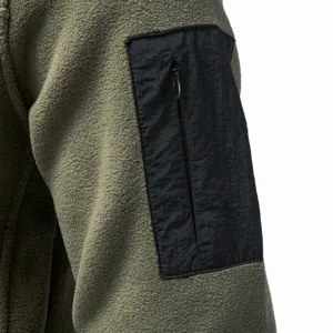 Detailed close-up of men's fleece jacket sleeve with functional zipper pocket in green.