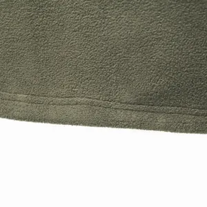 Close-up detail of army green fleece fabric showing neat stitching and cozy soft texture.