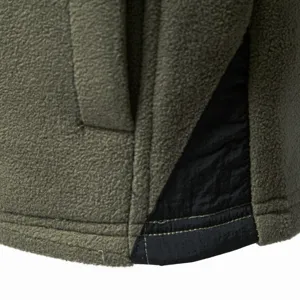 Close-up detail of mens outdoor fleece sweatshirt showing texture, stitching and side panel.