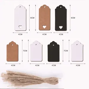 Kraft paper gift tags with heart cutout and hemp rope, blank hang tags for clothing and decor.