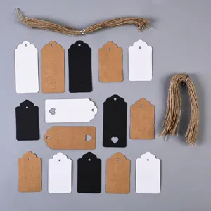 Blank kraft paper tags with heart cutouts, white and black tags, ideal for clothing and gift labels.