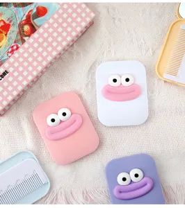 Miroir de maquillage portable mignon design avec peigne pour filles et étudiants.