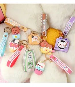 Schattige cartoon sleutelhanger set met siliconen bandjes en diverse hangers voor auto.