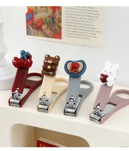 Cute cartoon nail clippers set for kids and students, portable mini metal cutter tool.