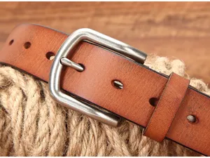 Vintage men genuine leather belt detailed close up shot with metal pin buckle and strap