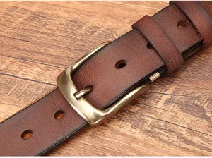 Men vintage genuine leather belt detail shot, premium cowhide with retro pin buckle design.