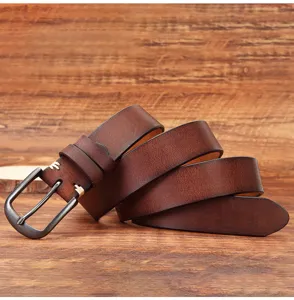 Men's genuine leather vintage belt with solid pin buckle and handmade stitching details.