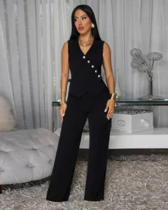 Black sleeveless asymmetrical button vest matching long pants set, elegant women outfit detail.