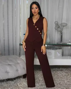 Detailed view of women's maroon sleeveless asymmetrical button vest and matching trousers set.
