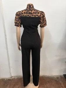 Elegante γυναικεία ολόσωμη φόρμα με λεοπάρ μοτίβο, φουσκωτά μανίκια και ψηλό γιακά.