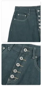 Close-up detail of retro distressed denim jeans with unique five-button fly and contrast stitching.
