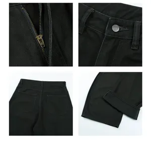 Detailed view of black casual trousers showing zipper, button, pockets and hem texture.