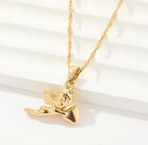 Gold angel pendant necklace detail shot, elegant titanium steel clavicle chain jewelry close up.