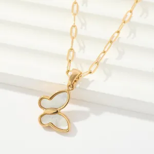 Gold butterfly pendant necklace with mother of pearl inlay on paperclip chain chic jewelry