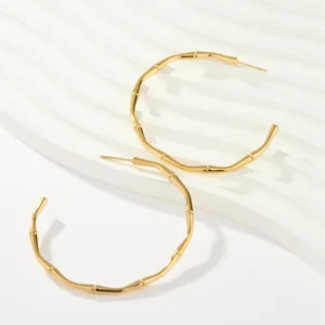 Gold bamboo hoop earrings for women stylish metallic statement jewelry main photo display