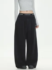 Black wide leg sweatpants for men with cool double waistband, loose fit casual athletic pants.
