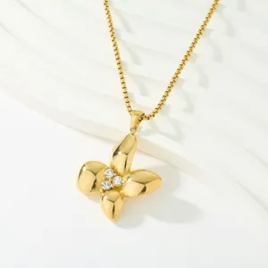 Elegant gold plated 4-petal flower pendant necklace with sparkling crystal details.
