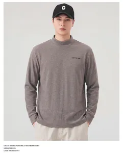 Close-up detail of the men's casual mock neck long sleeve t-shirt with stylish design.
