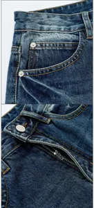 Detailed view of vintage washed blue denim jeans with classic yellow stitching hardware.