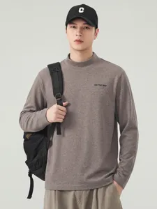Men's casual mock neck long sleeve t-shirt in brown, loose fit comfortable autumn wear.