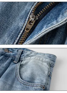Closeup of vintage style men straight denim jeans, showing metal zipper and pocket details.