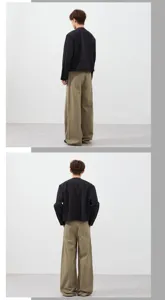 Back view detail of loose fit retro cargo trousers paired with a black jacket for men.