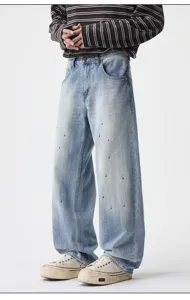 Men's retro high street straight leg denim jeans with stylish paint splatter design for casual wear.