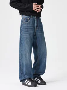 Men's vintage dark blue washed loose straight denim jeans, classic casual cotton trousers.