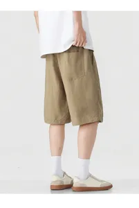 Back view of casual loose linen shorts detail showing pocket and comfortable summer fit wear