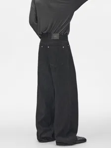 Men's vintage cleanfit loose straight denim jeans back view showing wide leg drape style.