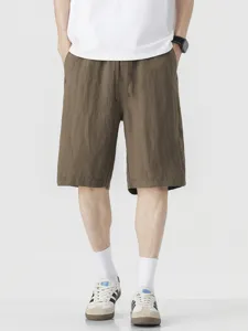 Men's casual summer linen shorts, lightweight loose fit five-point trousers with drawstring.