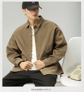 Men's vintage utility long sleeve loose casual button-down shirt jacket in stylish khaki color.