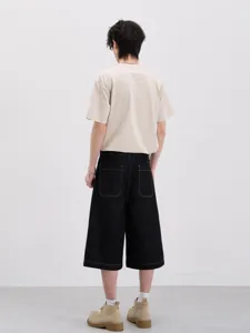 Shorts larghi da uomo in denim grezzo lavato stile streetwear vintage casual per l'estate calda.