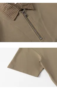 Heren contrast ruit kraag halve rits korte mouw polo shirt detail weergave stof.