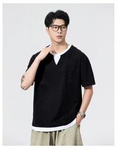Detailed view of the casual men's fake two-piece short sleeve t-shirt in classic black.