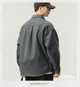 Men's casual loose long sleeve workwear shirt back view, solid dark gray button down top.