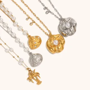 Trendy resort style pearl and metal chain necklaces featuring unique shell and flower pendants.