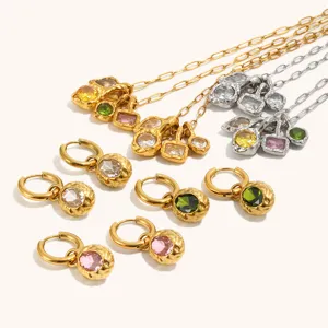 Stainless steel 18K gold hammered colorful diamond necklace and earrings jewelry set detail.