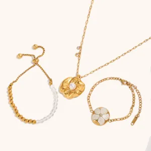 Gold-plated titanium steel necklace and bracelet set featuring chic floral pendants and pearls