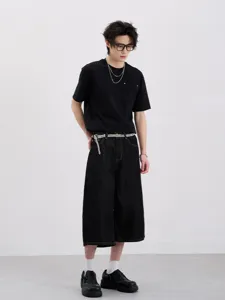 Men's black casual t-shirt and wide leg denim cargo shorts set, streetwear style outfit.